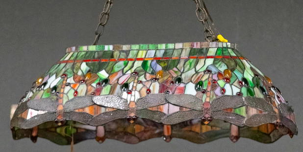 Beautiful leaded and stained glass hanging Billiard Light Fixture, measures 32" L x 18" W x 12" T,: Beautiful leaded and stained glass hanging Billiard Light Fixture, measures 32" L x 18" W x 12" T, lamp is jeweled with dragon fly pattern. The Late C.W. & Marie Lyle Estate.