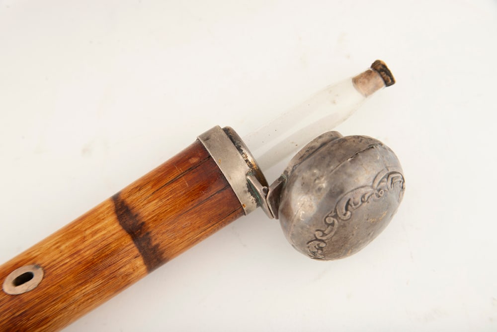 Antique Wooden Cane with engraved silver pommel. NOTE: The hinged handle opens to reveal a glass: Antique Wooden Cane with engraved silver pommel. NOTE: The hinged handle opens to reveal a glass whisky flask. NOTE: Pommel has several hallmarks and unique peep hole. Very good condition, 33" L, glas