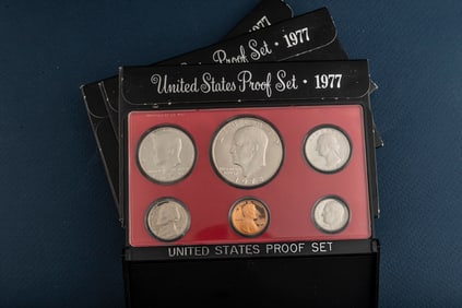 Group of five (5) uncirculated cased 1977 U.S. Proof Sets, totaling 30 coins. Each set contains 6
