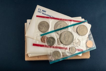 Group of four (4) U.S. 1977, uncirculated Proof Sets totaling 24 Coins. Each case contains A silver