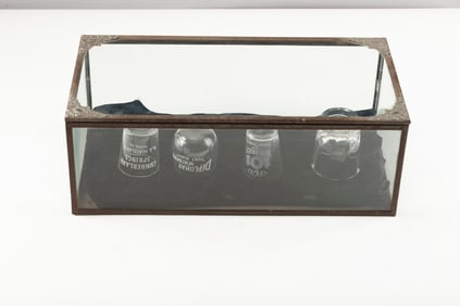 Unique glass and metal, vintage Display Case, 14" L x 7" W x 4 1/2" T, with fancy embossed corners.