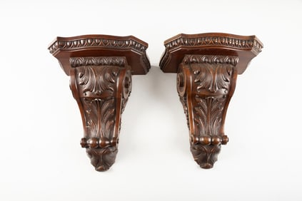 Matched pair of carved Corbels (Shelves), very good condition with heavy brass hanging brackets.