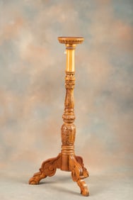 Carved wooden Fern Stand with carved center column and claw feet, measures 52" T x 9" round top,