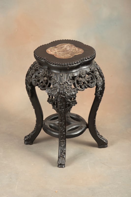 Carved oriental teakwood Jardinière Stand with inlaid marble top, measures 20" T x 11" dia. at top,: Carved oriental teakwood Jardinière Stand with inlaid marble top, measures 20" T x 11" dia. at top, very intricately carved, very good condition. The Late C.W. & Marie Lyle Estate.