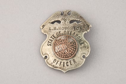 Vintage Shield Badge with eagle crest marked "L.H. Houghton/State of Oklahoma/Officer". The Oklahoma