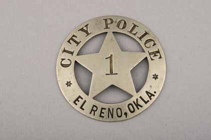 Vintage Circle Star Badge with 5-point cut out star marked " City Police/El Reno, Okla." with "1" in