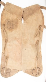 Pair of rough out, two tone Batwing Chaps with outside pockets and latigo string border, with