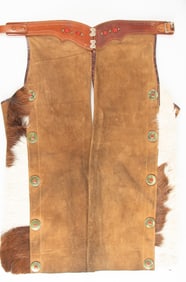 Pair of rough out leather Youth Chaps with concho and hair on hide border, 31 1/2" L and are batwing