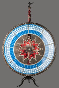 Antique Gambling Wheel with 5 ft. wheel on its original two-piece stand, with original cast iron