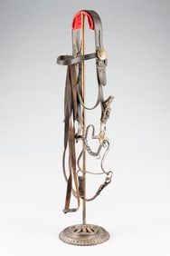 "U.S." marked iron Cavalry Bit and matching Head Stall, accompanied by a custom iron Bridle Stand.