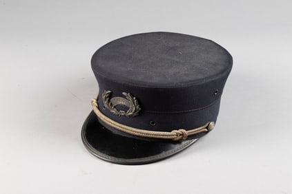 "City Marshall" marked oval shaped wreath Cap Badge on a cloth Hat with leather sweat band and black