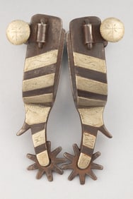 Inside marked "Crockett" single mounted Spurs, #145, engraved swing buttons with chap guards. Maples