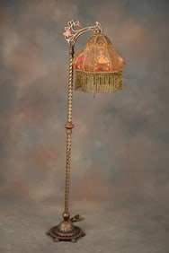 Matching to previous lot. Very ornate cast iron and brass Floor Lamp with fancy footed base, 16"