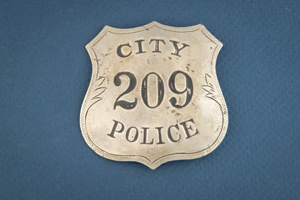 Vintage large Shield shaped Badge marked “CITY/209/POLICE??. Nice old Badge with ticking around
