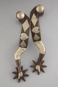 Pair of "C.P. Shipley, Kan. City, Mo." marked, single mounted gal-leg Spurs with silver engraved