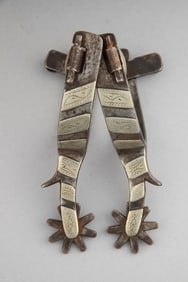 Pair of inside marked "Crockett" single mounted Spurs, #185, with chap guards and large swing