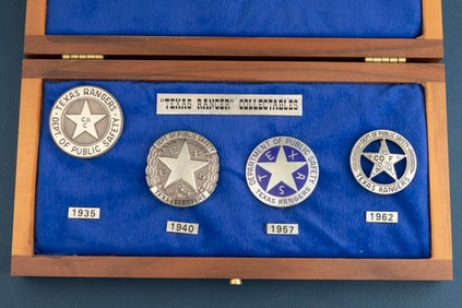 Cased Set of four Badges. These are the same type used by the Rangers dating from