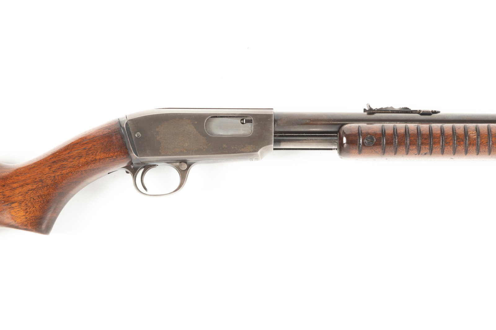 Winchester, Model 61, Slide Action Rifle, .23 SL or LR caliber, SN 273450, blue finish, 24" barrel,: Winchester, Model 61, Slide Action Rifle, .23 SL or LR caliber, SN 273450, blue finish, 24" barrel, overall nice condition, showing some thinning of blue on receiver, nice wood to metal fit. Much varn