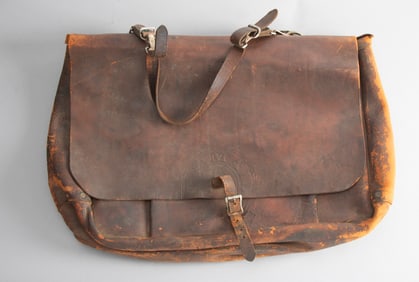 Large vintage leather Mail Bag with flap cover and leather carry strap. Embossed on front "U.S.