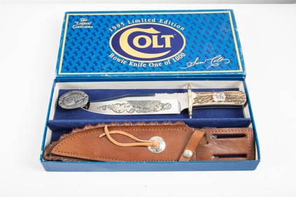 "Colt" marked Clip Point Bowie Knife in original picture box. Marked on blade "Colt to the Core".