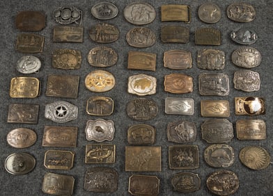 Huge collection of embossed brass Belt Buckles totaling 54, ranging in size of 3"- 4" across. All