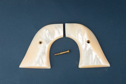 Pair of Pearl two-piece Grips for a Colt SAA Revolver.