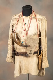 Authentic Doe Skin, fringed Shirt with embroidered stars and fancy beadwork. Accompanied by a Powder