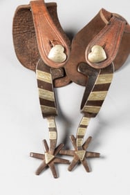 Pair of inside marked "Crockett" single mounted Spurs, #111, with etched fixed heart buttons, Ever