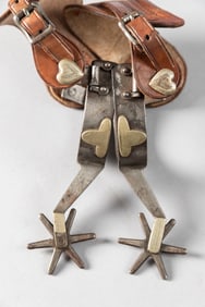 Pair of "Kelly Bros." marked single mounted Spurs, #98, Del Rio Pattern, with silver overlaid