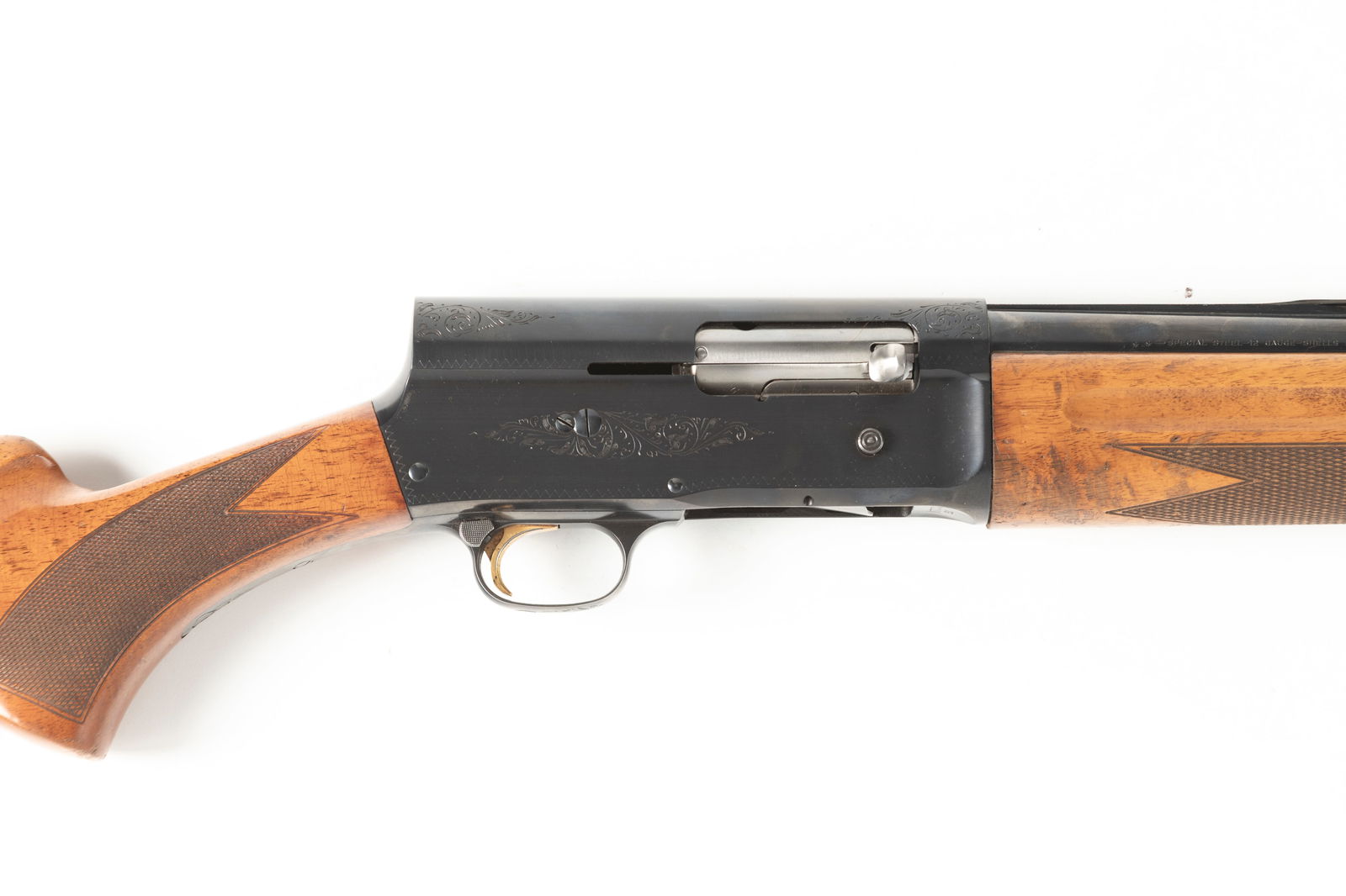 Belgium Browning, Model A-5, 12 ga. Auto Shotgun, marked "Light Twelve" with gold trigger, SN: Belgium Browning, Model A-5, 12 ga. Auto Shotgun, marked "Light Twelve" with gold trigger, SN 7G71221, blue finish, 26" ribbed barrel, lightly engraved receiver, walnut checkered stock, shows some han