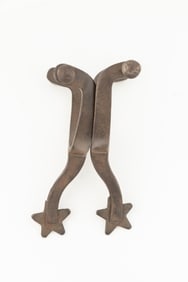 Pair of McChesney "Arm & Hammer" marked Spurs, #14, single mounted with silver fixed buttons. Maples