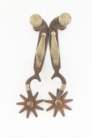 Pair of inside marked "Crockett" Spurs, #177, with bottle opener shanks, etched fixed buttons.