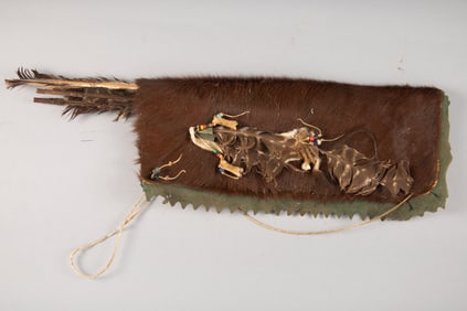Vintage Quiver, believed to be made from buffalo hide, decorated with feathers and bead work, with