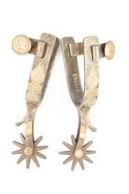 Pair of inside marked "Crockett" single mounted Spurs, #181, with chap guards and etched swing