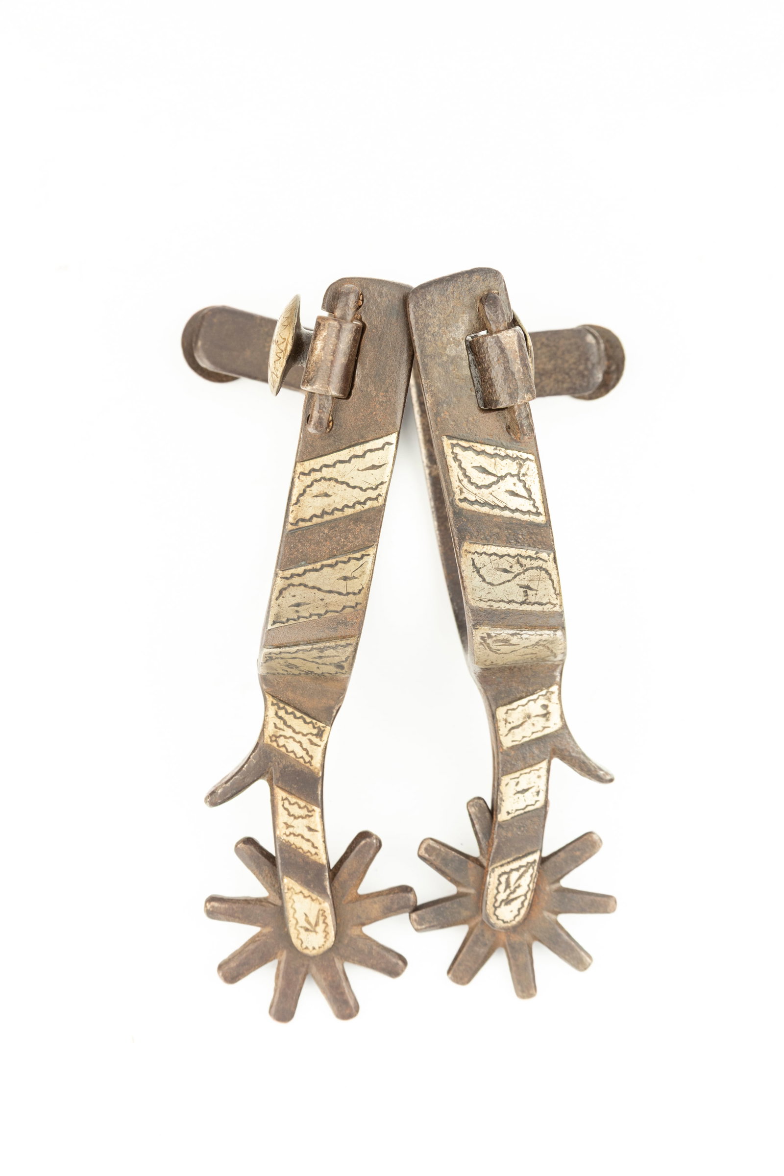 Pair of inside marked "Crockett" single mounted Spurs, #165, with chap guards and etched swing: Pair of inside marked "Crockett" single mounted Spurs, #165, with chap guards and etched swing buttons. Maples Estate.