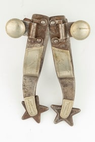 Pair of unmarked single mounted Spurs, shop made, initial "O" is stamped under the swingers on both