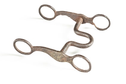 Iron Bit marked "C.P. Shipley, Kan City, MO" with raised silver heart on cheek piece. One heart is