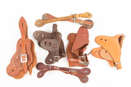 Collection of five Spur Straps, three of these will accommodate double buttons. Will be sold as a