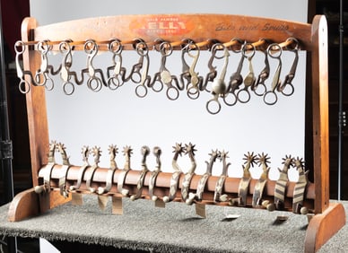 A vintage Factory original "Kelly" marked wooden Bit & Spur Rack. Marked four times "World Famous