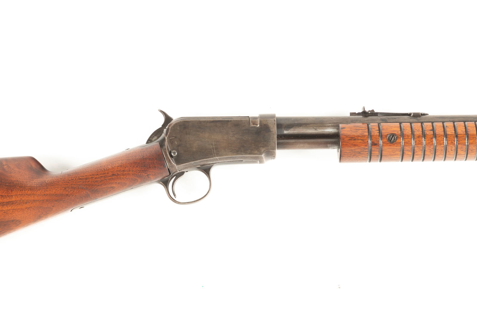 Winchester, Model 62 A, Slide Action Rifle, .22 S.L. or L.R. caliber, SN 112852, blue finish, 22": Winchester, Model 62 A, Slide Action Rifle, .22 S.L. or L.R. caliber, SN 112852, blue finish, 22" barrel, retaining much blue finish with balance smooth gray aged patina, walnut stock with much remain