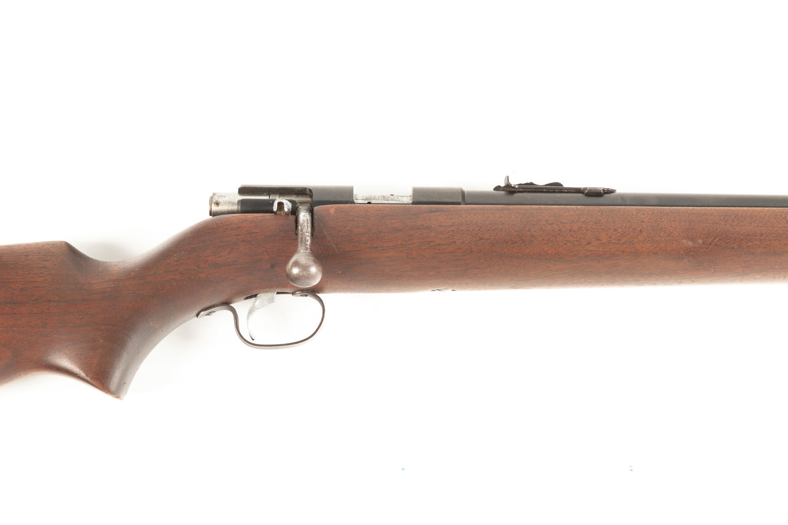 Winchester, Model 47, Single Shot Bolt Action Rifle, .22 S.L. or L.R. caliber, SN NV, blue finish,: Winchester, Model 47, Single Shot Bolt Action Rifle, .22 S.L. or L.R. caliber, SN NV, blue finish, 24" round barrel, walnut stock, overall good condition with some light handling marks. (Modern)