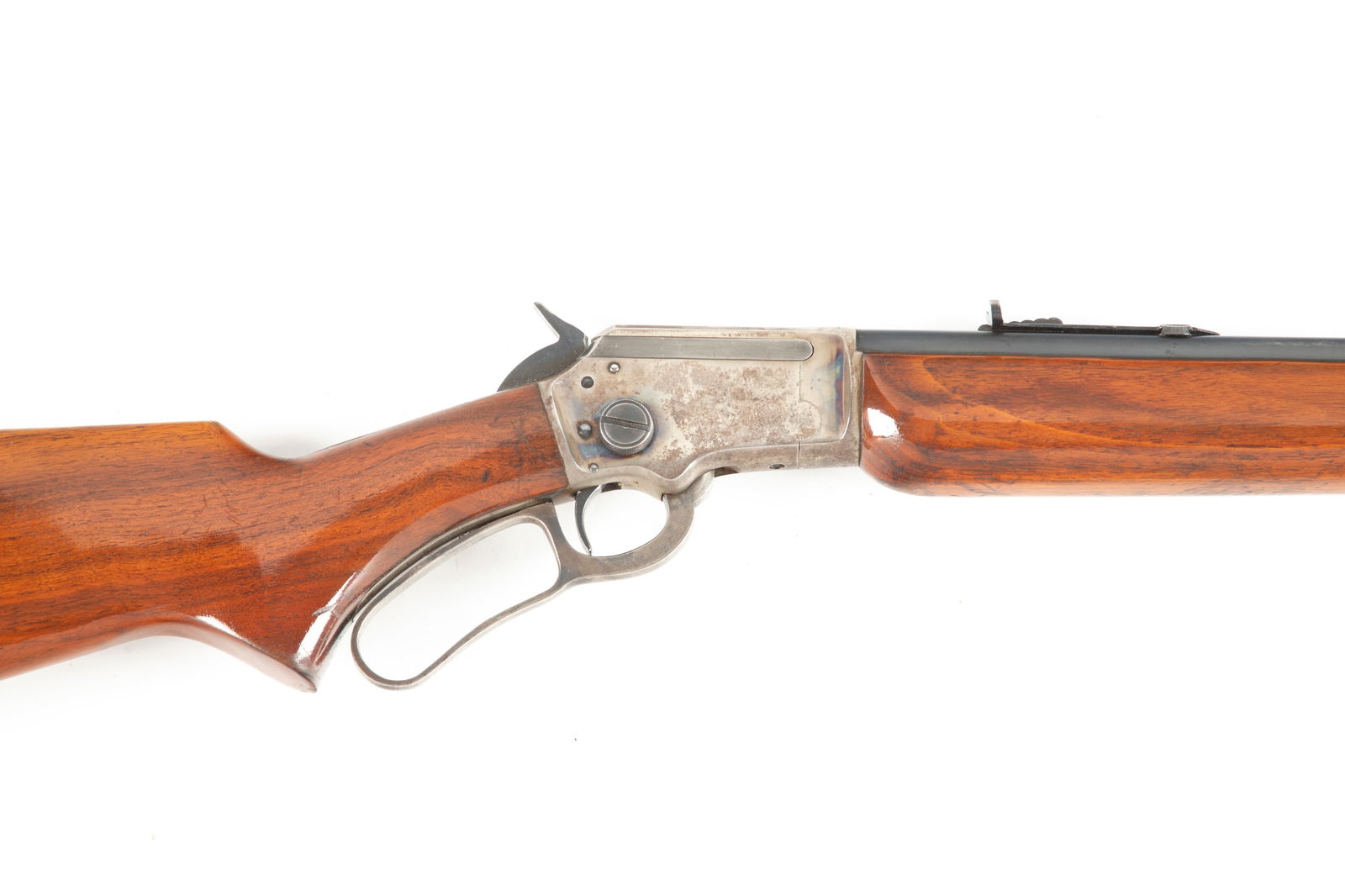 Marlin, Model 39 A, Lever Action Rifle, .22 S.R. & L.R. caliber, SN B4669, considered rare, only: Marlin, Model 39 A, Lever Action Rifle, .22 S.R. & L.R. caliber, SN B4669, considered rare, only made two years, 1939-1940. Blue finish with case hardened receiver, 24" barrel, walnut stock and forend