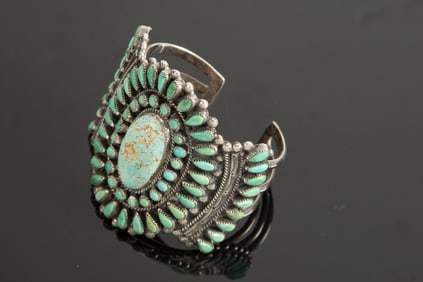 Fantastic silver Petit Point turquoise Cuff with maker mark "F.M.D.". The Zuni Indians started this