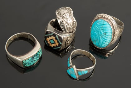 Collection of five "Sterling" marked Rings, four with turquoise inset, one with engraved Indian
