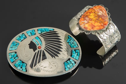 This lot consists of two Items to include: (1) A large oval silver Belt Buckle marked "100% Hand