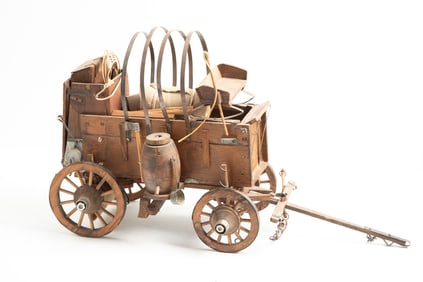 Handmade Wooden Replica of a Chuck Wagon decorated in miniature all the items needed for cooking on