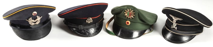 Collection of four (4) German Uniform Dress Hats to include: (1) Navy Blue Hat with red trim and
