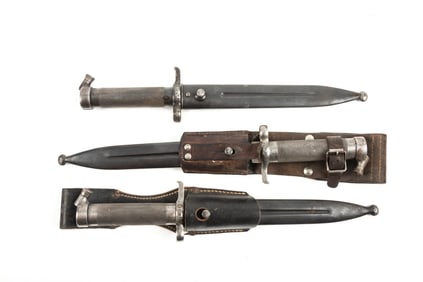 Three vintage Bayonets of Scandinavia, two of which have leather frogs, all three have their