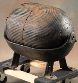 Antique cast iron, Hog Oiler, watermelon shaped device marked "Colombian Hog Oiler", farm devices