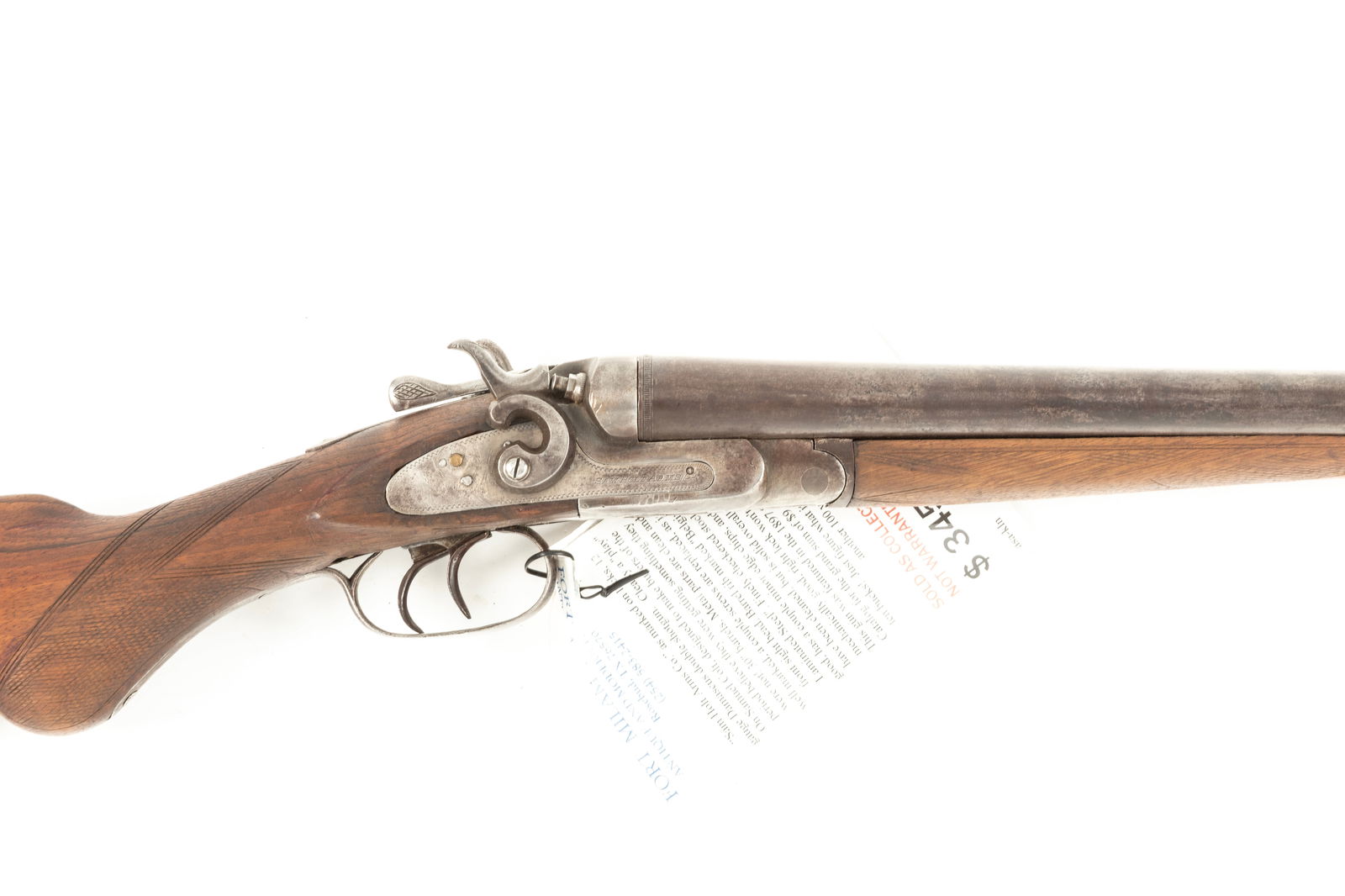 Sam Holt Arms Co., 12 ga. Double Barrel Shotgun, SN NV, barrel is marked "Belgium", 30" barrel with: Sam Holt Arms Co., 12 ga. Double Barrel Shotgun, SN NV, barrel is marked "Belgium", 30" barrel with rabbit ear hammer, walnut checkered stock and forend, shows minor handling marks. Hang tag shows thi